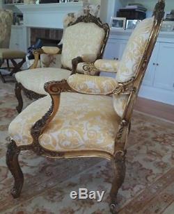 A PAIR OF French Louis XV Style (19th C) Gilt Armchairs. Upholstered in FORTUNY
