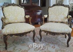 A PAIR OF French Louis XV Style (19th C) Gilt Armchairs. Upholstered in FORTUNY