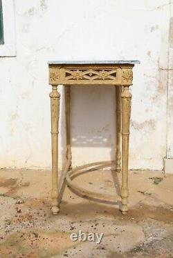 A Rare Louis XVI Console Table depicting a Faun Head with Original Marble Stone