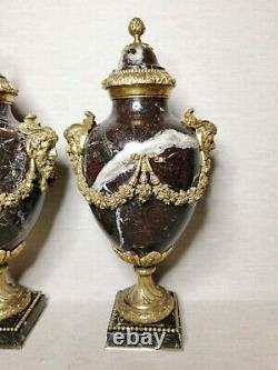 Antique A pair of French Louis XVI Style Bronze and marble candlesticks, 19th ce