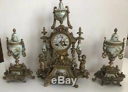 Antique French Louis The XVI Style Porcelain And Brass Clock And Garniture