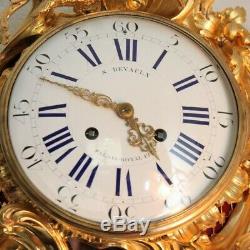 Antique French cartel wall clock of gilt bronze in the Louis XV style