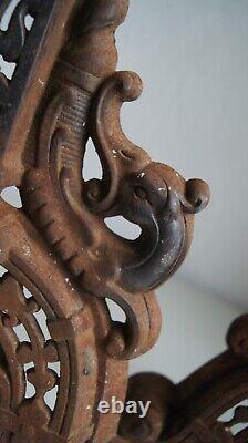 Antique pair of antique French cast iron Louis xv style chenets