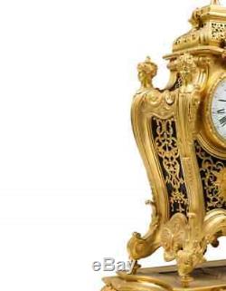 Bohemian A Louis XVI Style Antique Bronze Clock Head of Women On Sides Topped