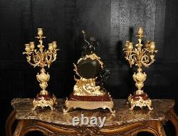 Exceptional Antique French Ormolu, Bronze and Red Marble Louis XV Clock Set