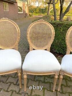 Exquisite Pair of French Louis XVI Cane Back Dining Chairs with Gold Leaf Finish