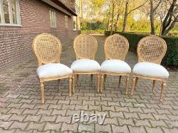 Exquisite Pair of French Louis XVI Cane Back Dining Chairs with Gold Leaf Finish