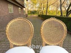 Exquisite Pair of French Louis XVI Cane Back Dining Chairs with Gold Leaf Finish