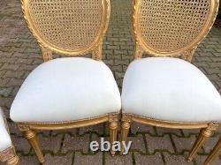 Exquisite Pair of French Louis XVI Cane Back Dining Chairs with Gold Leaf Finish