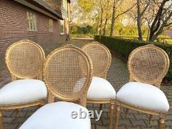 Exquisite Pair of French Louis XVI Cane Back Dining Chairs with Gold Leaf Finish