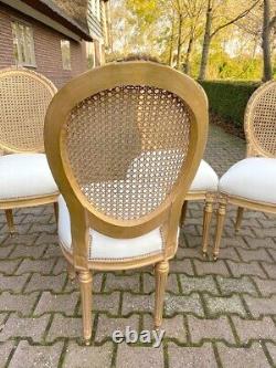 Exquisite Pair of French Louis XVI Cane Back Dining Chairs with Gold Leaf Finish