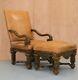 French 19th Century Louis Xiv Carved Oak Leather Armchair With Matching Stool