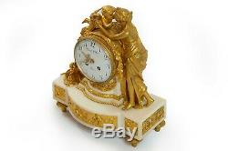 French 19th century Louis XVI gilded bronze and marble mantel clock
