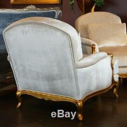 French Louis XV oversized Arm Chairs in antiqued gold leaf white velvet