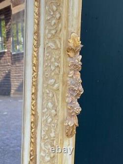 French Louis XVI Style Mirror in Antique Gold Leaf and Creme finish