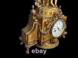 French Louis XVI style table / mantle clock in gilded alloy. Made 19th century