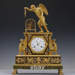 Jean-Louis Rouvière a Paris, 1805 Empire ormolu bronze mantel clock Allegory of