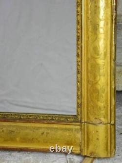 Louis Philippe gilded mantle mirror with decorative pediment and original glass