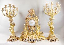 Magnificent 1840 French Louis XV Bronze Clock with Two Candelabras