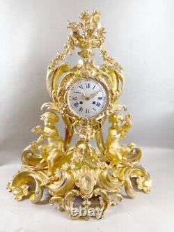 Magnificent 1840 French Louis XV Bronze Clock with Two Candelabras