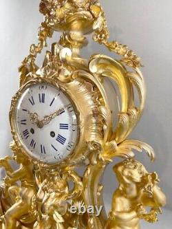 Magnificent 1840 French Louis XV Bronze Clock with Two Candelabras