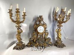 Magnificent 1840 French Louis XV Bronze Clock with Two Candelabras