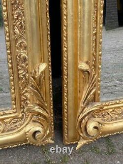 Pair of 20th Century French Louis XVI Style Gold Leaf Full-Length Wood Mirrors