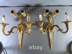 Pair of french Louis XVI Style wall sconces in gilded bronze