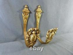 Pair of french gilt bronze curtain tiebacks in Louis XVI style late 19th century