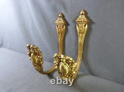 Pair of french gilt bronze curtain tiebacks in Louis XVI style late 19th century