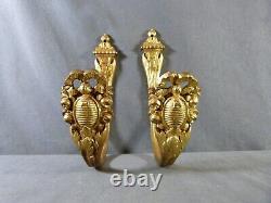 Pair of french gilt bronze curtain tiebacks in Louis XVI style late 19th century