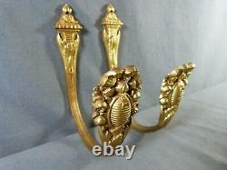 Pair of french gilt bronze curtain tiebacks in Louis XVI style late 19th century