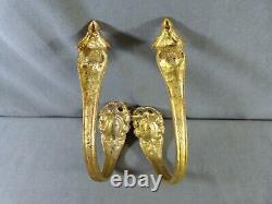 Pair of french gilt bronze curtain tiebacks in Louis XVI style late 19th century