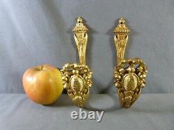 Pair of french gilt bronze curtain tiebacks in Louis XVI style late 19th century