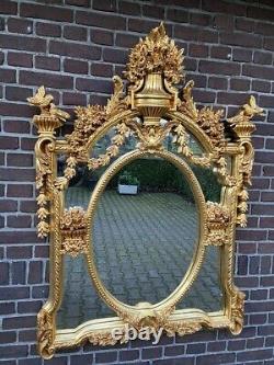 Wall mirror in French Louis xvi style. Worldwide shipping